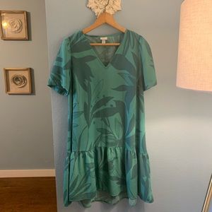 Green and white flowing dress